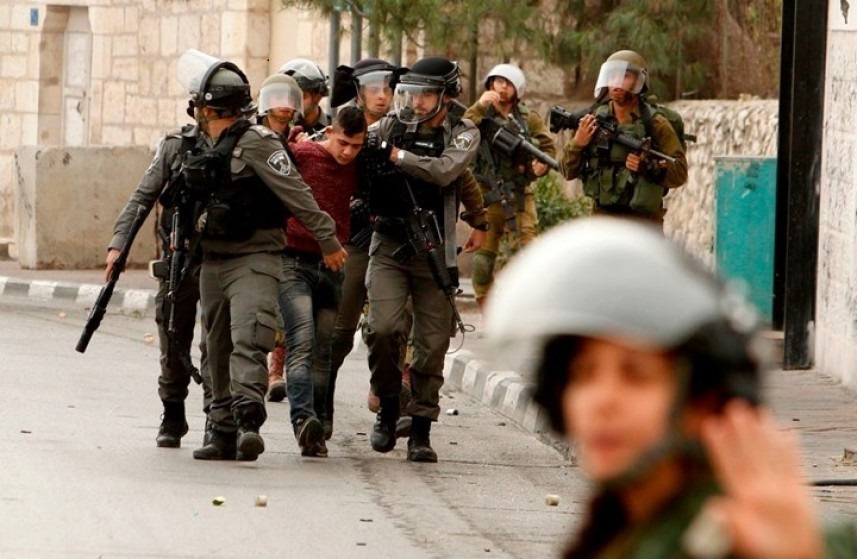 Israeli occupation forces detain at least 18 Palestinian in raids across the West Bank