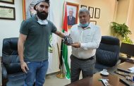 Al-Quds Open University student develops an electronic glove system that converts signals into text, audio