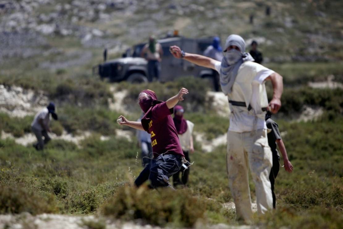 Rights group: Settler violence is sponsored by Israeli state