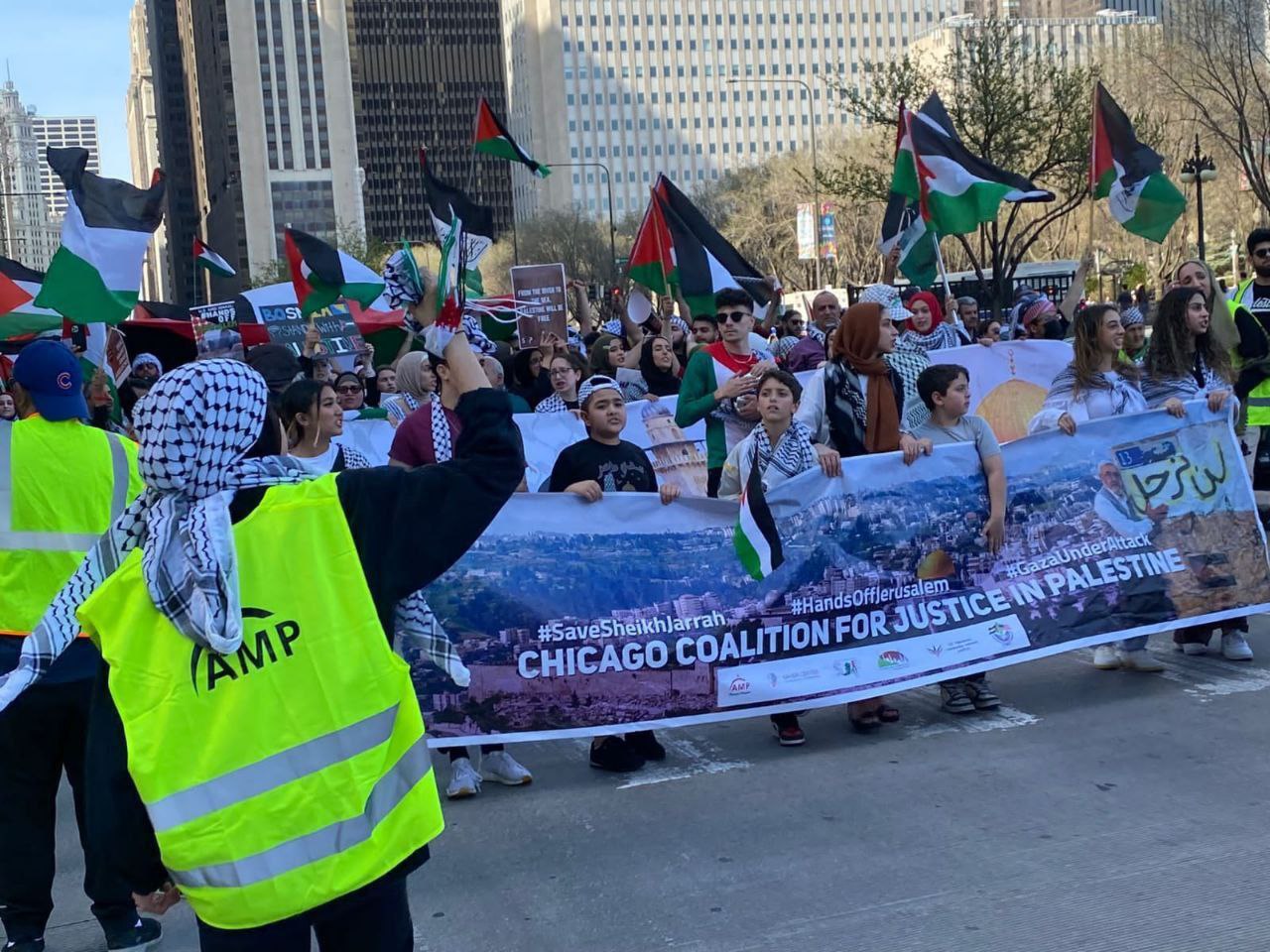 Hundreds take part in a rally in Chicago in protest of Israeli raids on Al-Aqsa