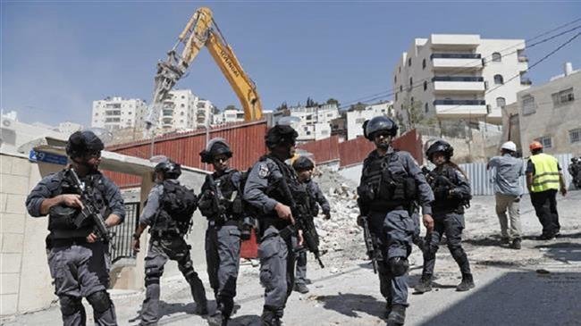 Israeli forces raid 50 homes in northern West Bank town in search for alleged assailant